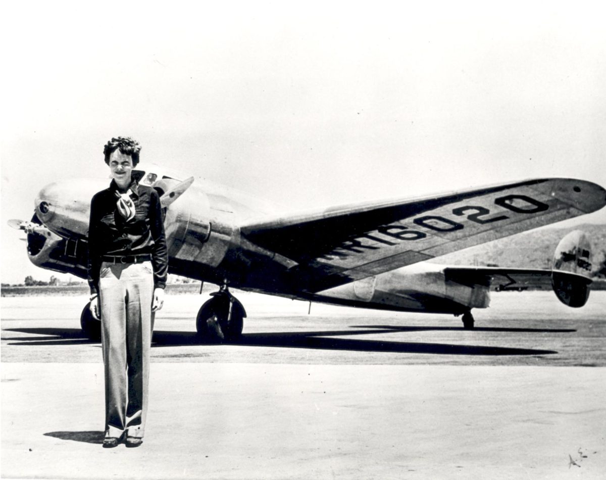 Amelia+Earhart+and+her+plane%2C+the+Lockheed+Electra+in+1937+before+her+and+her+planes+disappearance.+%28Wikimedia+Commons%29