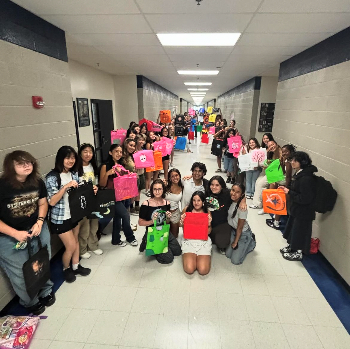 The LOHS Fashion Club, a club represented at club rush, with their painted tote bags, an activity the club put on for students. 