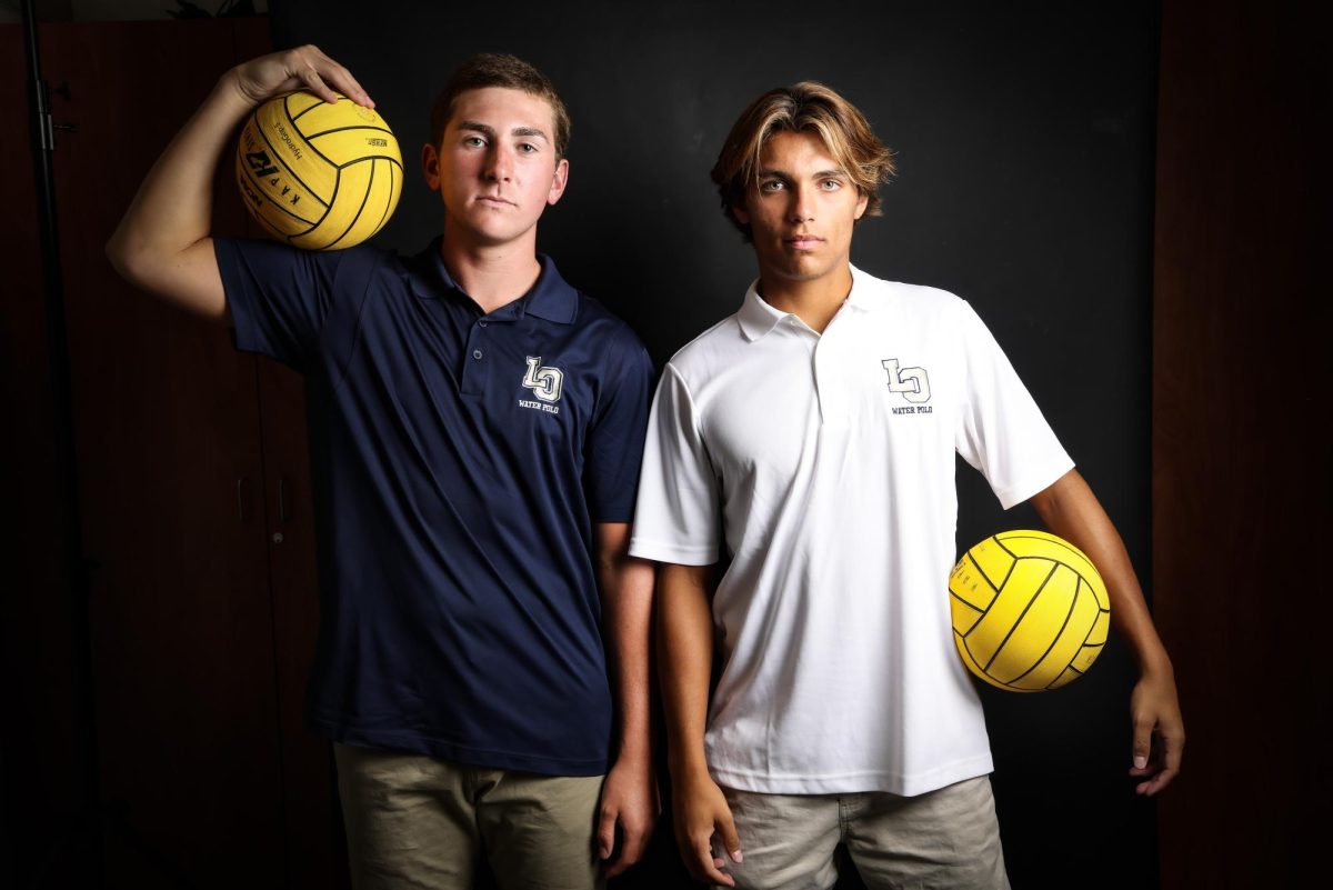 Seniors Mike Hale and Aidan Mattera promote the power of leadership in and out of the pool.