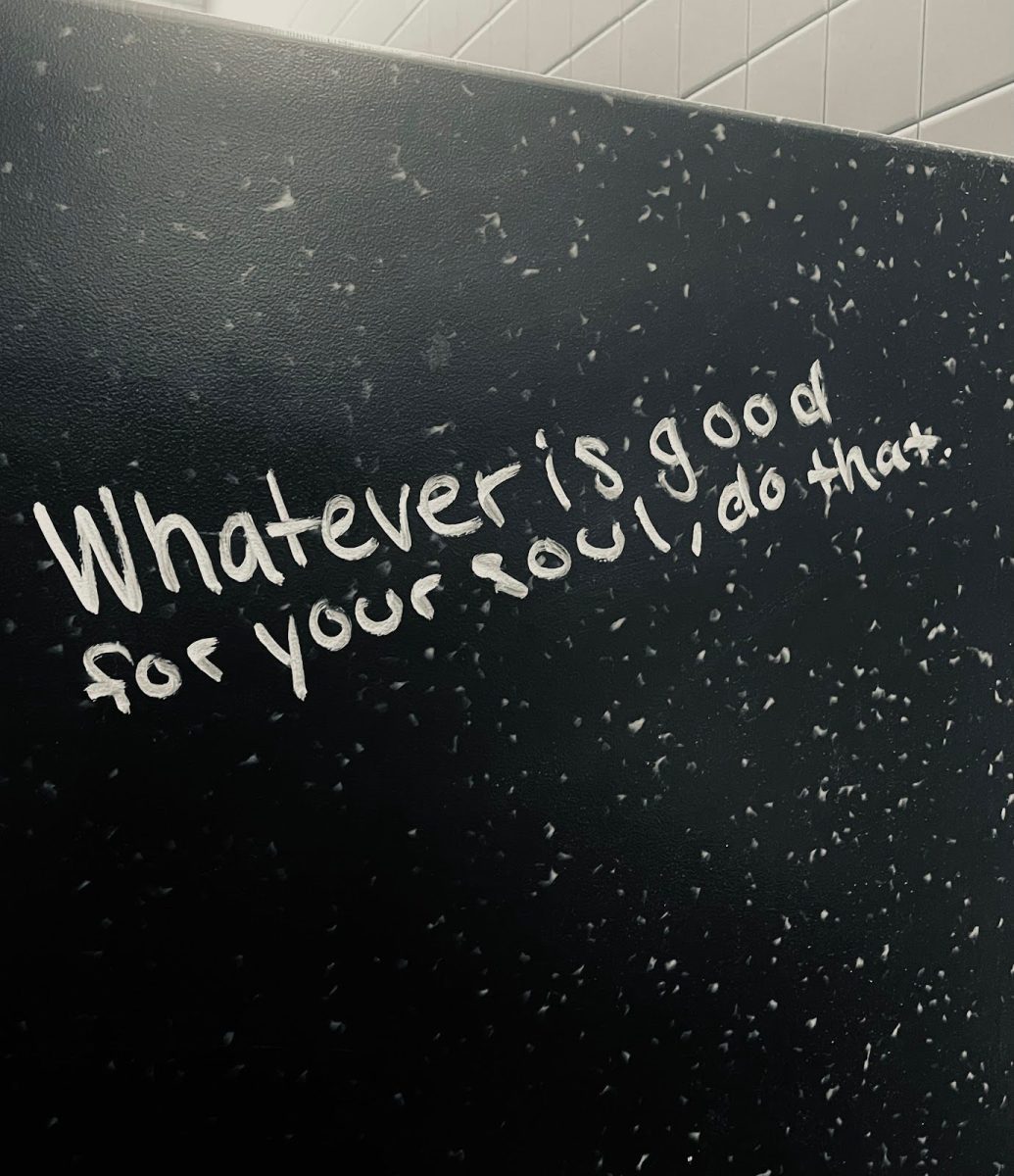  This photo was taken in Los Osos High School’s C building girls bathroom. A black and white photo of the interesting graffiti expressed on the walls surrounding the toilets. 
