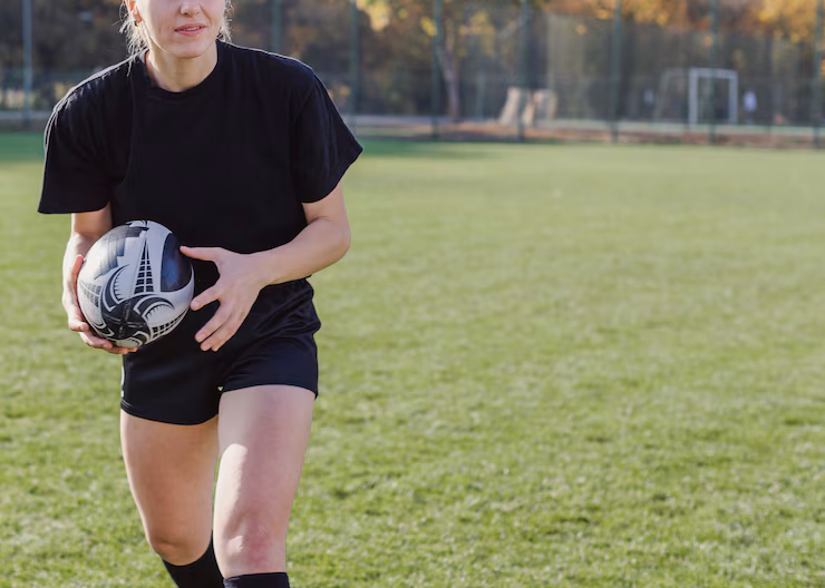 Our school has such an amazing girls Flag football team, and you should join! (FreePik)