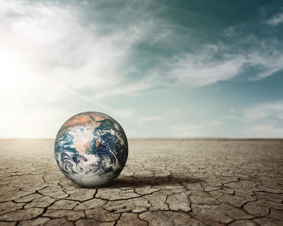 As the world sinks into the bottom of the ocean humans refuse to address the problem (Freepik)